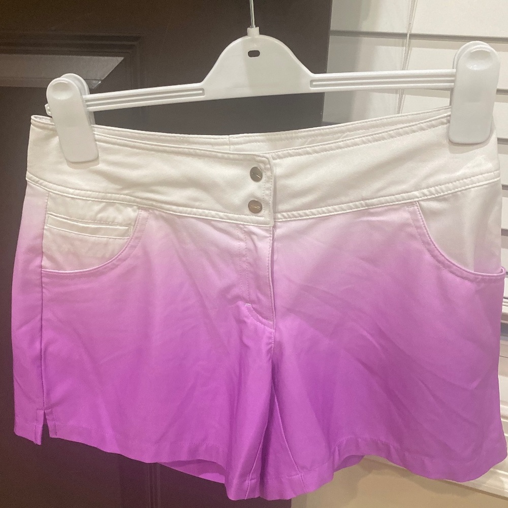 Slazenger tye-dye white and purple golf shorts.